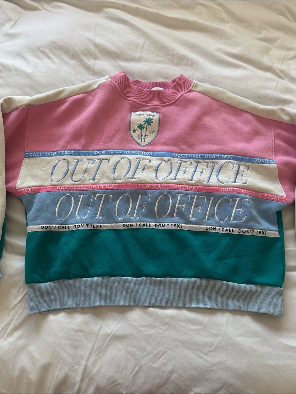 YLLW OOO CLUB OVERSIZED SWEATSHIRT out of office pink green yellow the label SM
